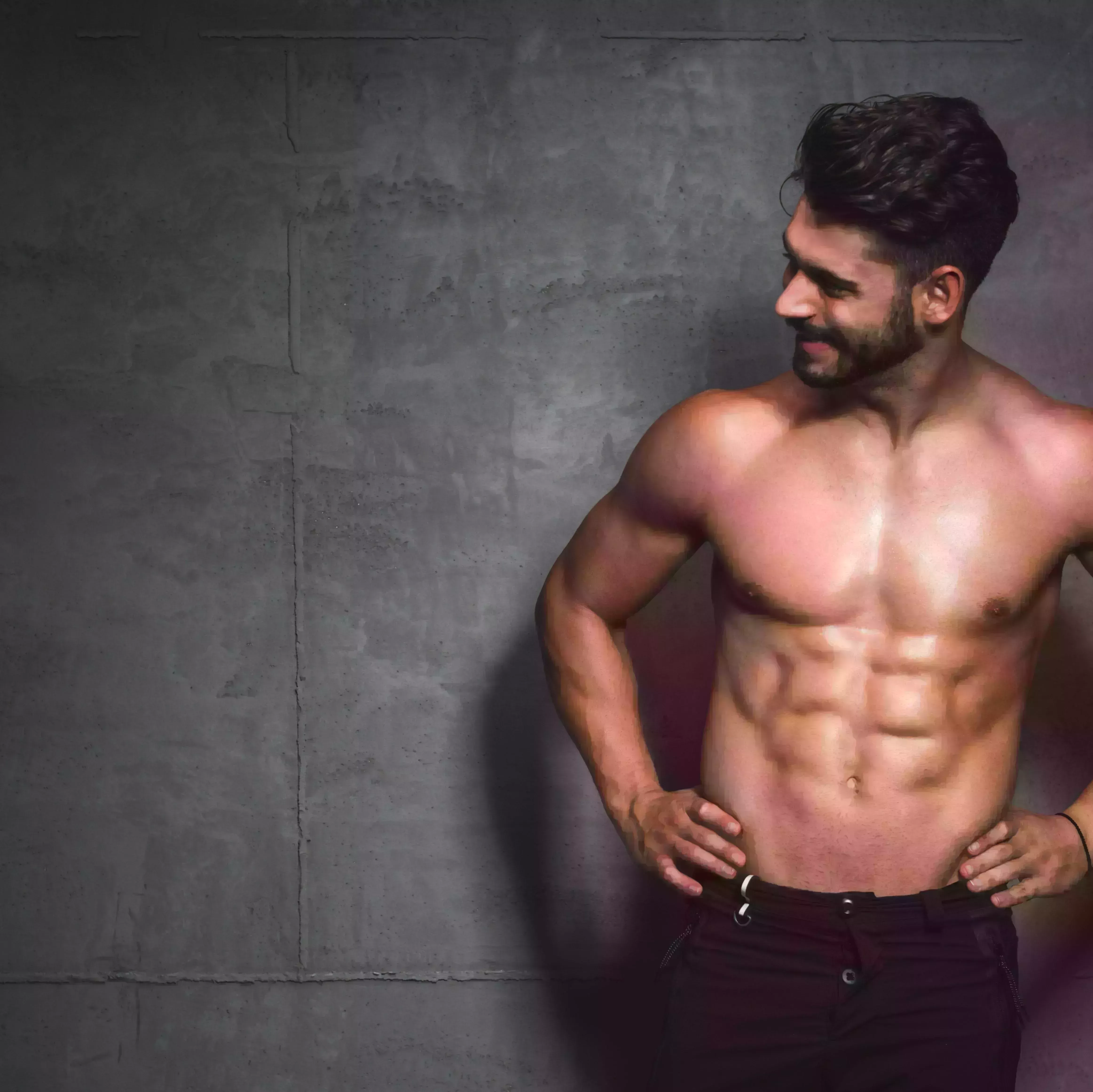 shot of a handsome and muscular young man posing shirtless in the studio