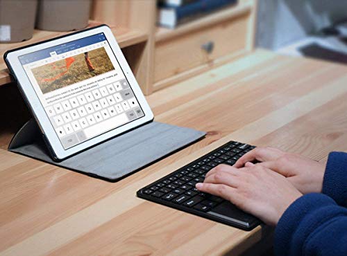 1byone Ultra-delgado teclado Inalambrico con una función de multi-touchpad y batería recargable, QWERTY español,Negro