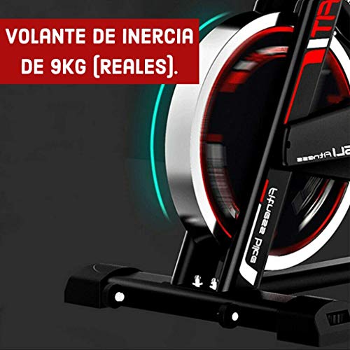 Bicicleta Spinning Perpetual Fitness Bici Estática Indoor Volante Inercia 9KG Resistencia Ajustable Monitor LCD Gimnasio Ejercicio y Entrenamiento Casa Hombre Mujer