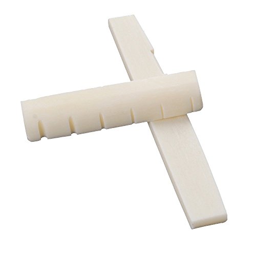 Conjunto de puente y cejuela de HUESO NATURAL para guitarra acústica. No es ABS, resinas o plástico. Conjunto de puente y cejuela de HUESO NATURAL para guitarra acústica. No es ABS, resinas o plástico.