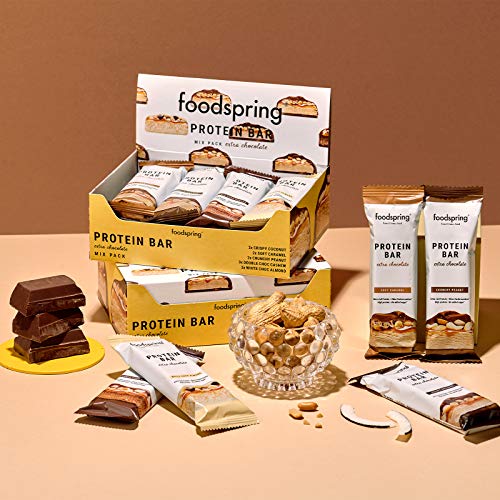 foodspring Barritas De Proteína Extra Choco, Chocolate Blanco y Almendras, 12 x 65g, una auténtica chocolatina con 95% menos de azúcares