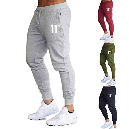 Frecoccialo Pantalones de Deporte para Hombre Chándal Ajustados Multicolores Cintura Elástica Ajustable Pantalon de Hombre Pitillo Deportivo con Bolsillos (Negro, M)