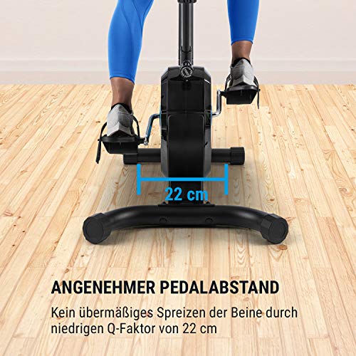 Klarfit Tauon - Bicicleta estática, Resistencia magnética con 8 Niveles, Soporte para Tablet, Pasamanos ergonómicos, Carga máx. 100 kg, Pantalla LC, Estructura de Metal, Ruedas de Transporte, Negro