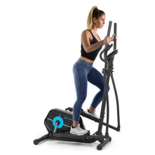 Klarfit Tauon - Bicicleta estática, Resistencia magnética con 8 Niveles, Soporte para Tablet, Pasamanos ergonómicos, Carga máx. 100 kg, Pantalla LC, Estructura de Metal, Ruedas de Transporte, Negro