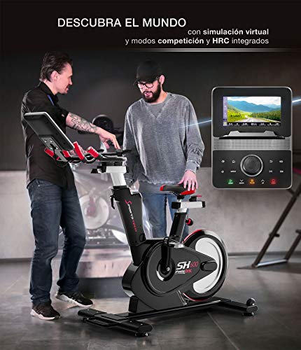 Sportstech Bicicleta de Elite - Marca de Calidad Alemana - Eventos en Directo & App Multijugador, Sistema de Freno magnético controlado por Ordenador, Volante de 26KG, Manillar Deportivo - SX600