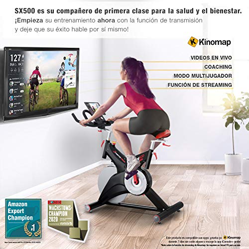 Sportstech Bicicleta estática profesional SX500 -Marca de Calidad Alemana -Eventos en vivo y App Multijugador, volante de 25KG, compatible con pulsómetro, Pedales de Click SPD, hasta 150KG, con eBook