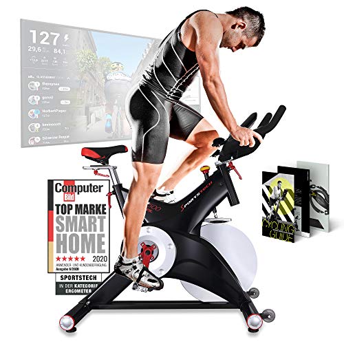 Sportstech Bicicleta estática profesional SX500 -Marca de Calidad Alemana -Eventos en vivo y App Multijugador, volante de 25KG, compatible con pulsómetro, Pedales de Click SPD, hasta 150KG, con eBook