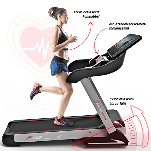 Sportstech F50 - Cinta de correr profesional con gran pantalla táctil LCD de 18,5 pulgadas y sistema operativo Android, más de 18 km/h, soporte para tableta, conexión USB y Wi-Fi, función autolubricante, pendiente del 15% y tamaño compacto y plegable