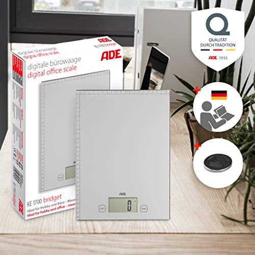 ADE Báscula digital multifunción KE1700 Bridget. Pesa y mide hasta 20 Kg. Báscula de paquetes. Cinta métrica. Incluye las baterías. Color Plata ADE Báscula digital multifunción KE1700 Bridget. Pesa y mide hasta 20 Kg. Báscula de paquetes. Cinta métrica. Incluye las baterías. Color Plata