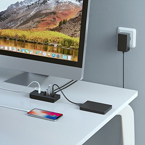 AUKEY Hub USB 4 Puertos USB 3.0 y 3 Puertos de Carga con Adaptador de Corriente 36W Hub USB 3.0 para Windows XP/Vista / 7/8, Mac OS, Linux, etc. AUKEY Hub USB 4 Puertos USB 3.0 y 3 Puertos de Carga con Adaptador de Corriente 36W Hub USB 3.0 para Windows XP/Vista / 7/8, Mac OS, Linux, etc.