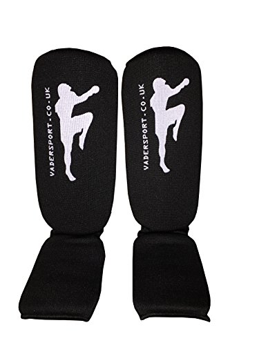 Espinilleras elásticas negras Shin & Instep Karate Muay Thai MMA,UFC, Taekwondo. Espinilleras y empeine para niños. Espinilleras y empeine elásticas para adultos (mediano/adultos o 10-14 años).