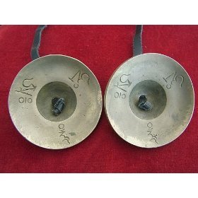 HERMOSA BUDISTAS TIBETANOS Chakra del Corazón Tingsha CYMBALS Reik, CLARO I ESPACIO , AID meditación, la música , sobre el cordón de cuero ; 6cm DIA. RELIEVE CON 2 TIBETANOS dragones ; IDEA REGALO inusual único - Vendido por dones espirituales . Por lo ge