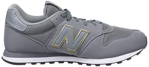 New Balance Gw500v1, Zapatillas de Deporte para Mujer, Gris (Grey/Gold Gkg), 39 EU