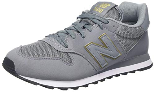 New Balance Gw500v1, Zapatillas de Deporte para Mujer, Gris (Grey/Gold Gkg), 39 EU