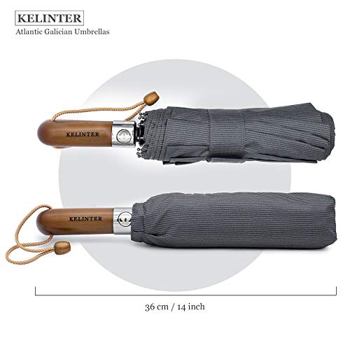 Paraguas Plegable Elegante Resistente al Viento -Automático e Impermeable Botón Único - Mango de Madera Clásico -10 Varillas reforzadas Antioxidantes -para Hombre y Mujeres-Diseñado en Galicia. Paraguas Plegable Elegante Resistente al Viento -Automático e Impermeable Botón Único - Mango de Madera Clásico -10 Varillas reforzadas Antioxidantes -para Hombre y Mujeres-Diseñado en Galicia.