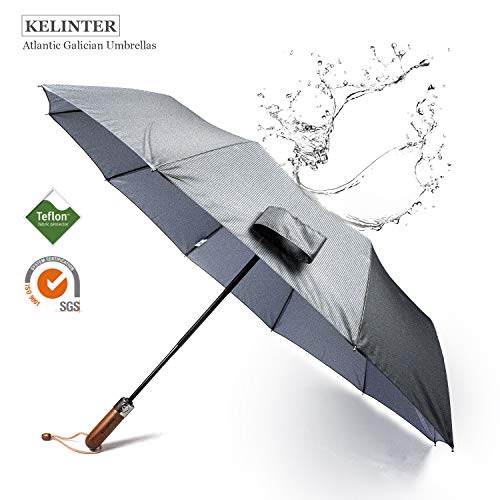 Paraguas Plegable Elegante Resistente al Viento -Automático e Impermeable Botón Único - Mango de Madera Clásico -10 Varillas reforzadas Antioxidantes -para Hombre y Mujeres-Diseñado en Galicia. Paraguas Plegable Elegante Resistente al Viento -Automático e Impermeable Botón Único - Mango de Madera Clásico -10 Varillas reforzadas Antioxidantes -para Hombre y Mujeres-Diseñado en Galicia.