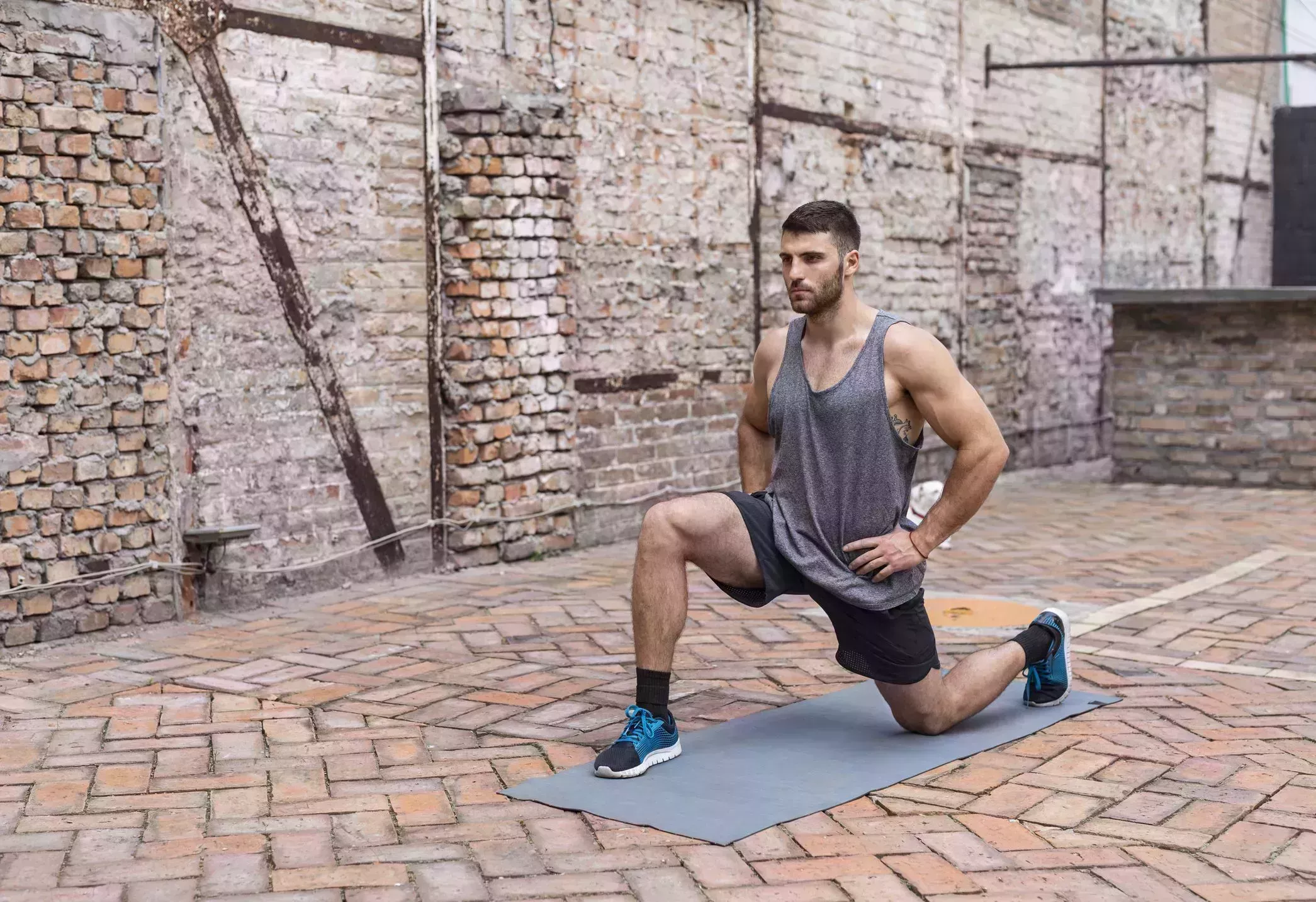 Handsome Young Man Working Out in his Backyard