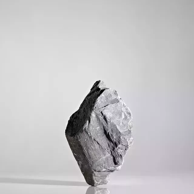 a large rock, precariously balanced