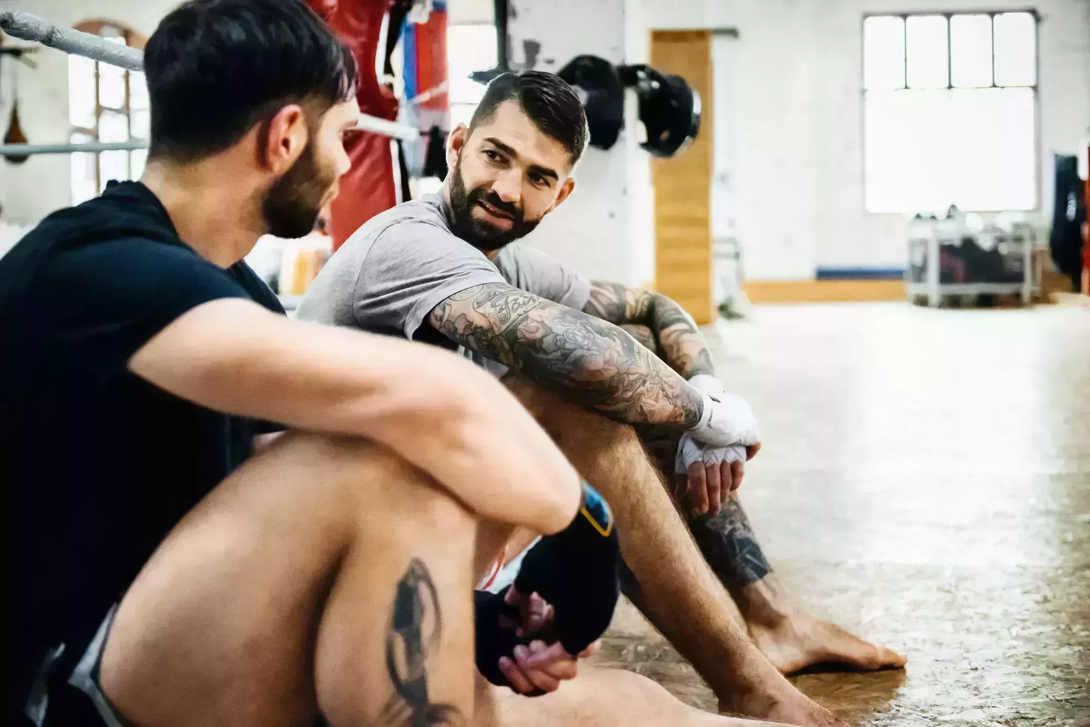 two muay thai boxing athletes talking