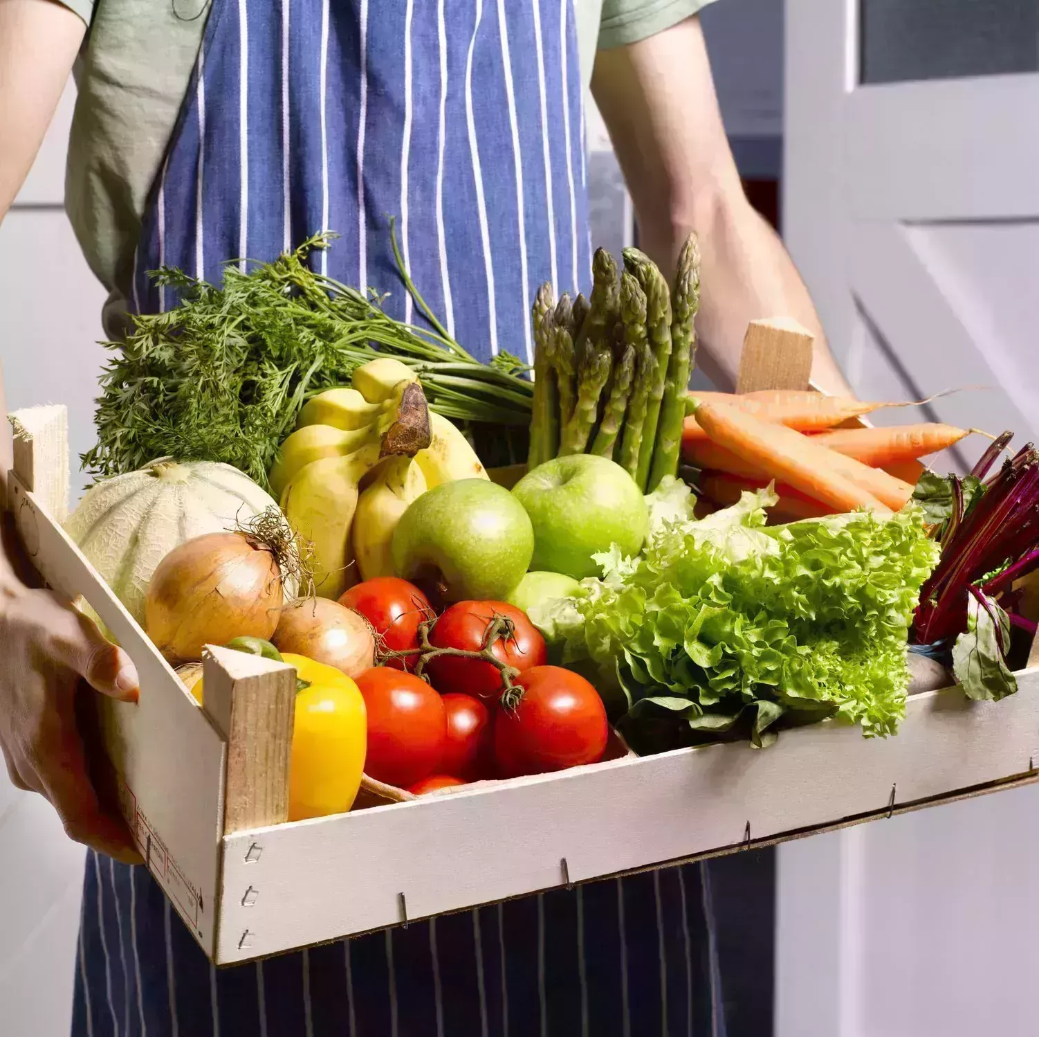 man delivering fruit and vegetable box