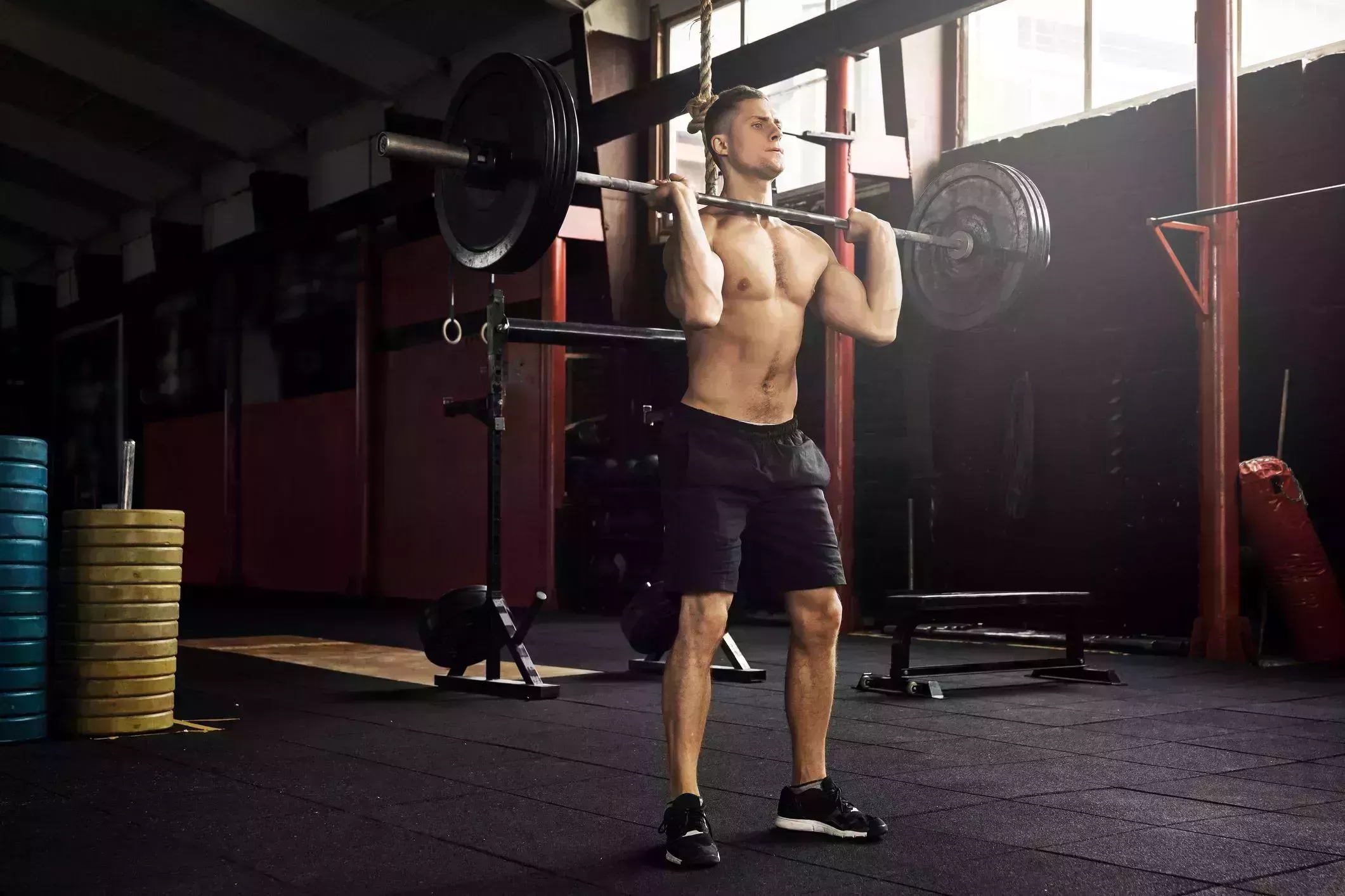 muscular man during his weightlifting workout in the gym