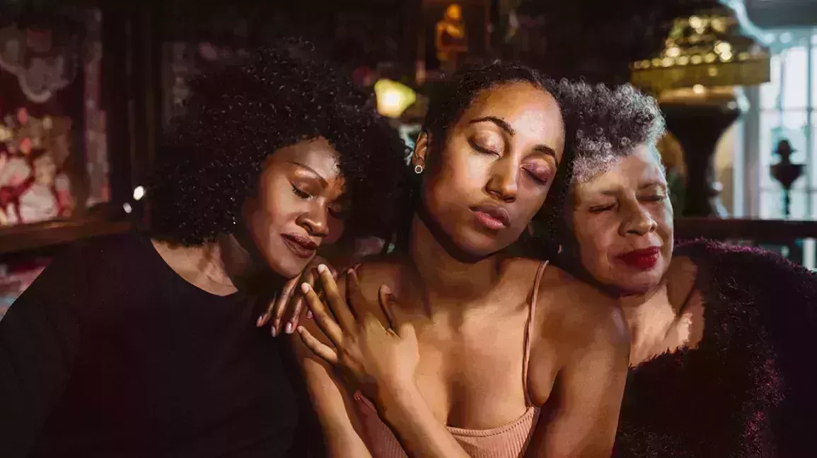 Multiple generations of Black women nurturing one another