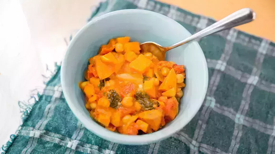 bowl of curry with chickpeas and sweet potatoes