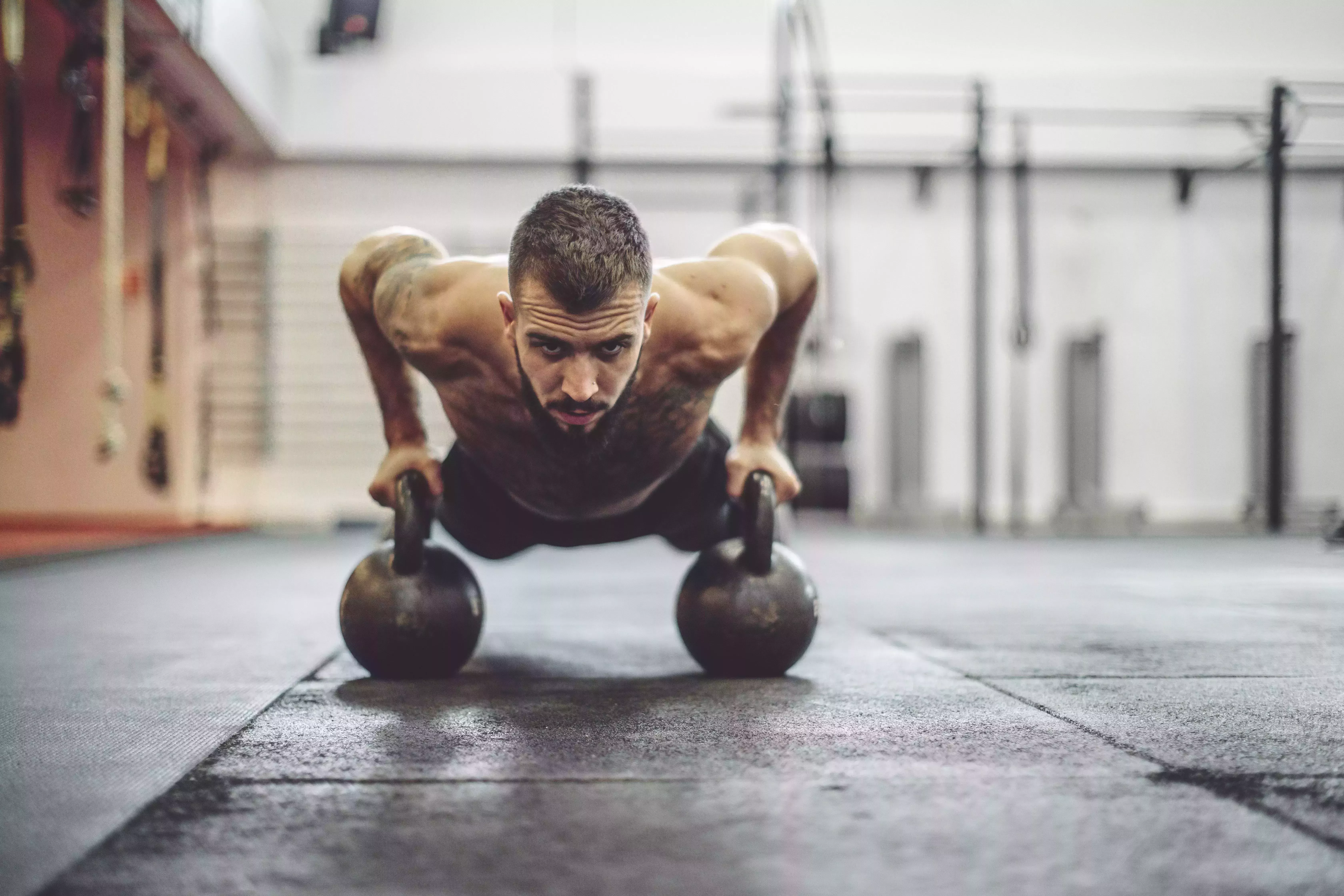 young man is doing cross training exercise