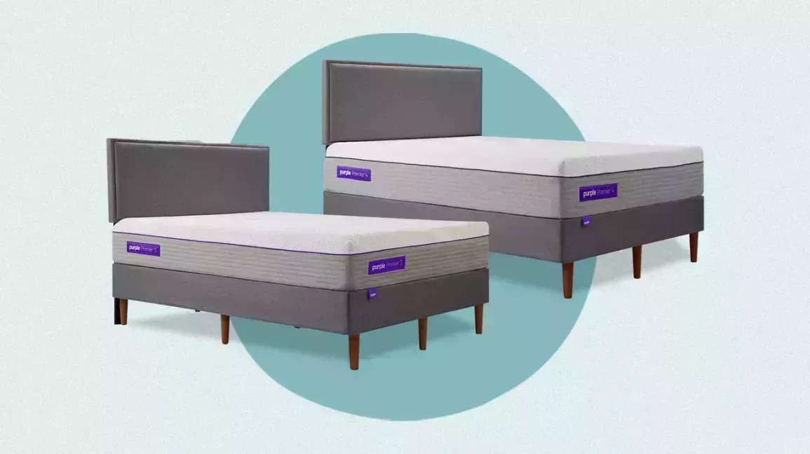 Two Purple brand mattresses on bed frames with headboards. Both are side by side for shoppers to compare their look.