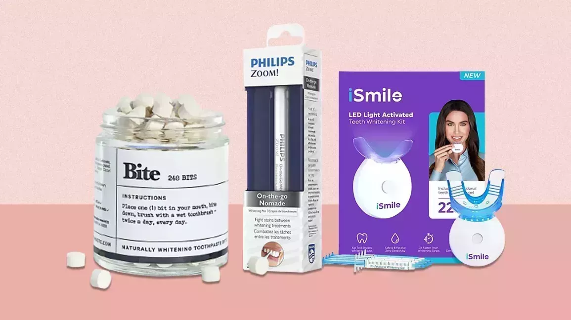bite toothpaste, philips zoom, and ismile whitening products in a line against a pink background