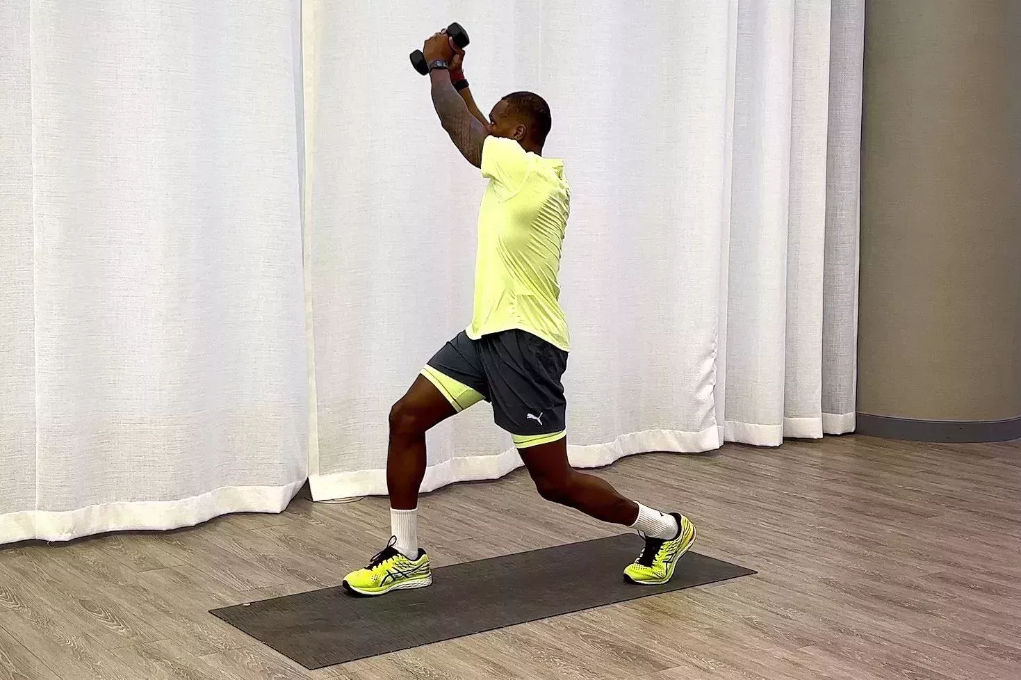 10-minute core workout, Yusuf Jeffers practicing split stance reverse chop 10minute core workout, yusuf jeffers practicing split stance reverse chop