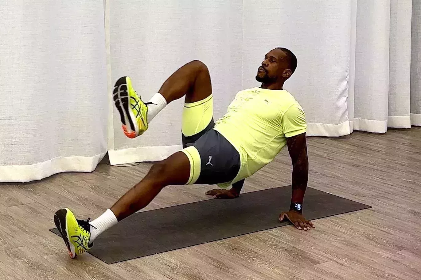 10-minute core workout, Yusuf Jeffers practices reverse mountain climber exercise 10minute core workout, yusuf jeffers practices reverse mountain climber exercise