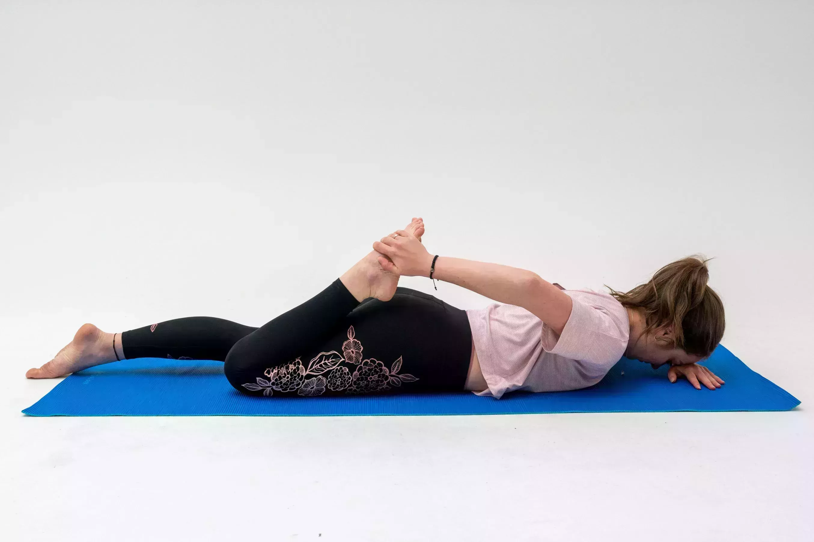 prone quad stretch