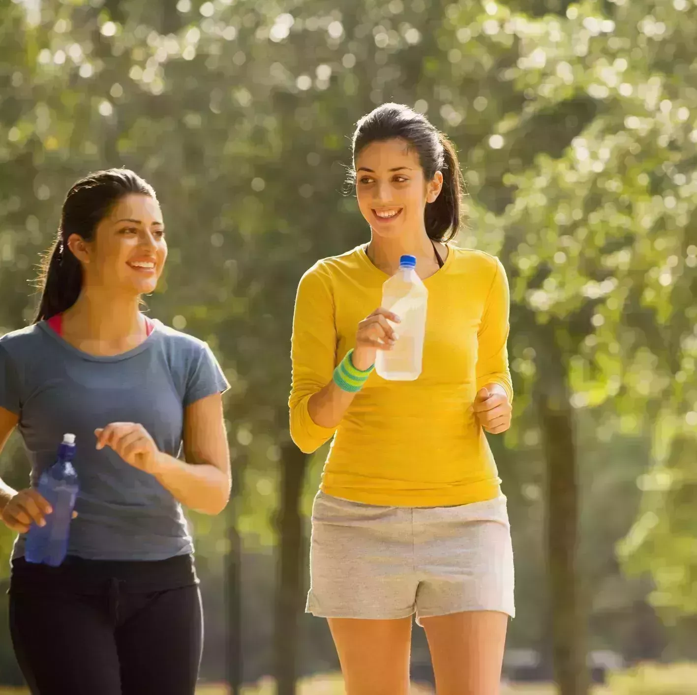 hispanic women walking in park