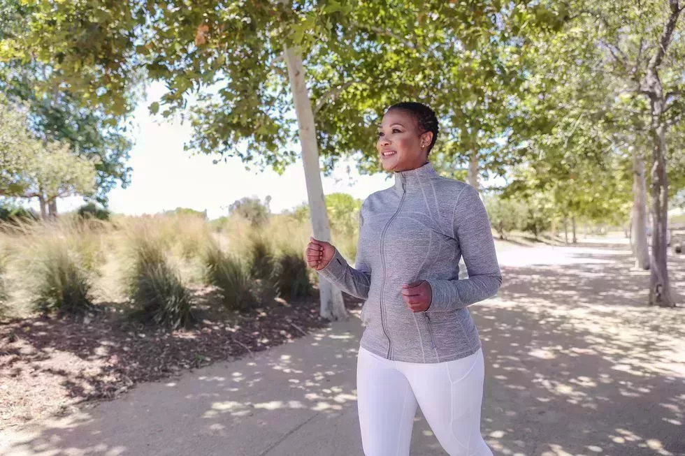 attractive black woman exercising in nature
