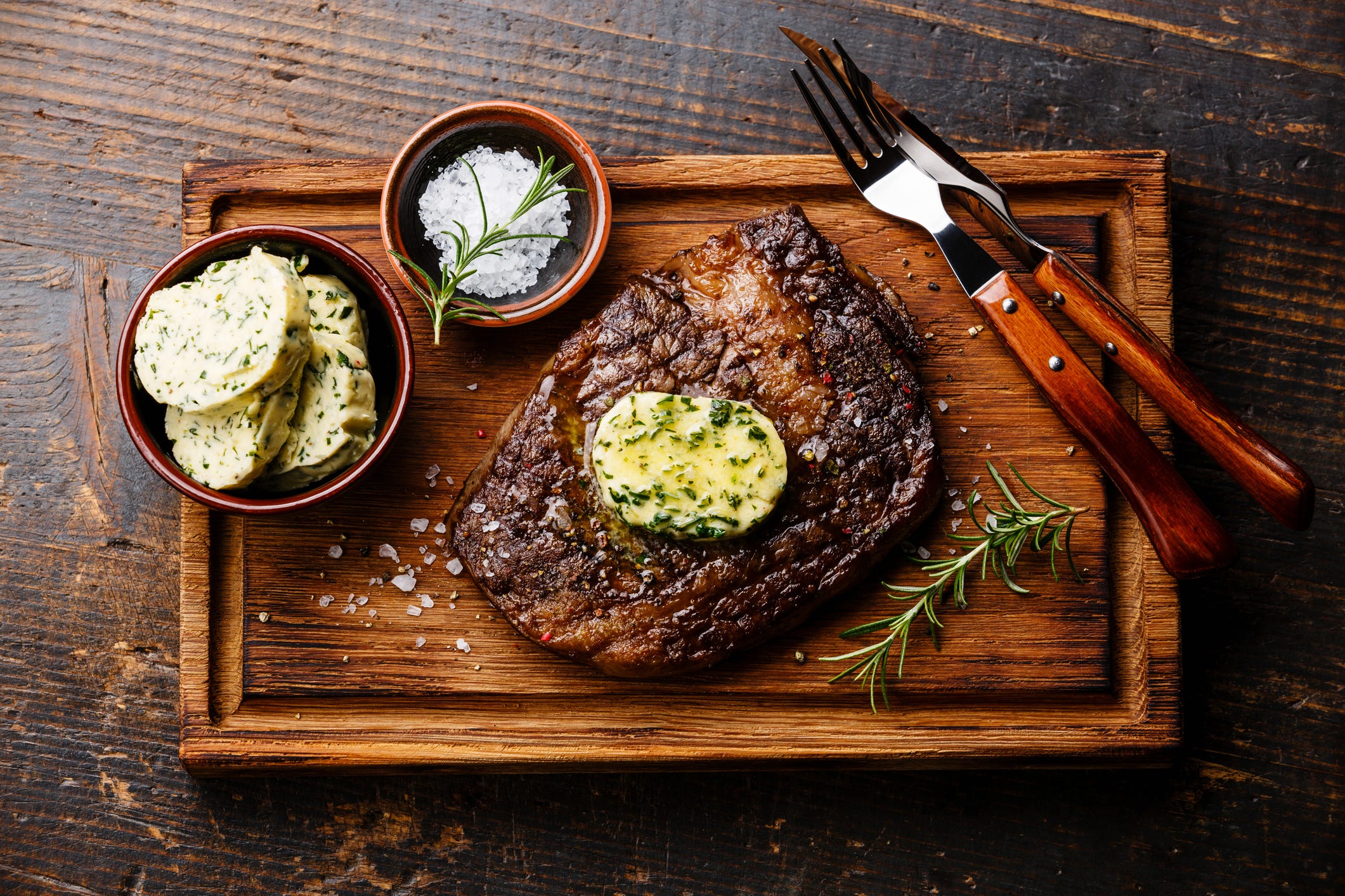 Sliced grilled steak Ribeye with herb butter