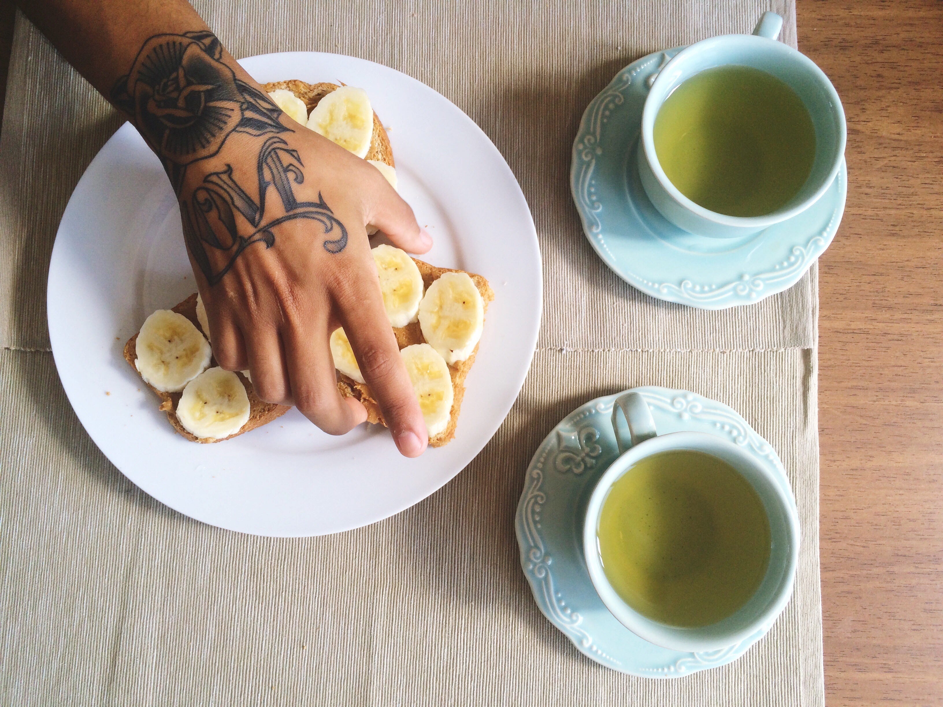 Cropped Image Of Man Having Breakfast At Table